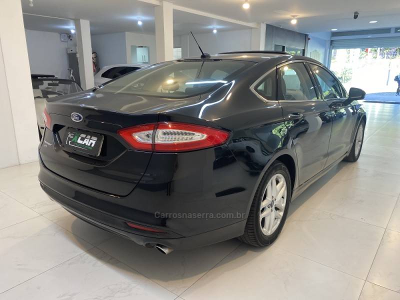 FORD - FUSION 2.5 16V FLEX 4P AUTOMÁTICO - 2014/2015 - Preta - R$ 75.900,00
