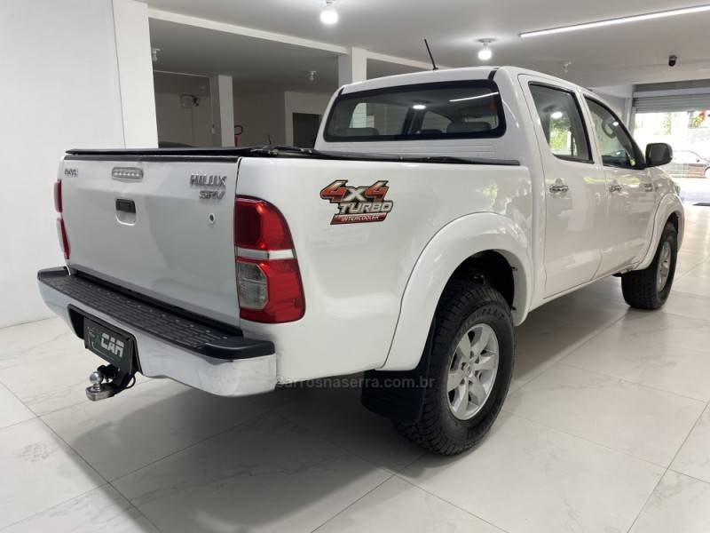TOYOTA - HILUX 3.0 SR 4X4 CD 16V TURBO INTERCOOLER DIESEL 4P AUTOMÁTICO - 2011/2012 - Branca - R$ 119.900,00
