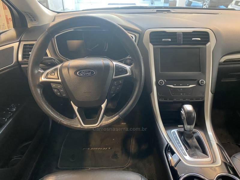 FORD - FUSION 2.5 16V FLEX 4P AUTOMÁTICO - 2014/2015 - Preta - R$ 75.900,00