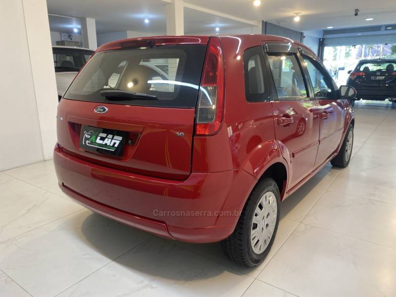 FORD - FIESTA 1.6 ROCAM SE 8V FLEX 4P MANUAL - 2014/2014 - Vermelha - R$ 39.900,00
