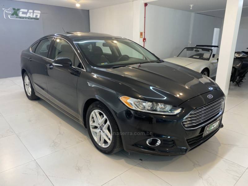 FORD - FUSION 2.5 16V FLEX 4P AUTOMÁTICO - 2014/2015 - Preta - R$ 75.900,00