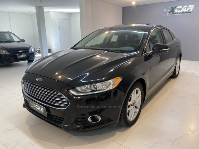 FORD - FUSION 2.5 16V FLEX 4P AUTOMÁTICO - 2014/2015 - Preta - R$ 75.900,00