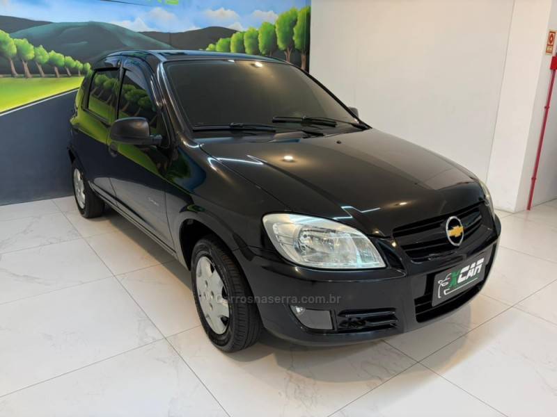 CHEVROLET - CELTA 1.0 MPFI SPIRIT 8V FLEX 4P MANUAL - 2009/2010 - Preta - R$ 21.900,00