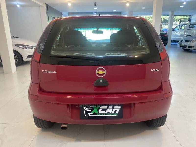 CHEVROLET - CORSA 1.0 MPFI 8V GASOLINA 4P MANUAL - 2003/2004 - Vermelha - R$ 24.900,00