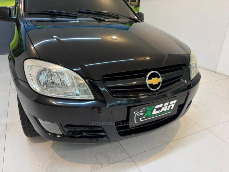 CHEVROLET - CELTA 1.0 MPFI SPIRIT 8V FLEX 4P MANUAL - 2009/2010 - Preta - R$ 21.900,00