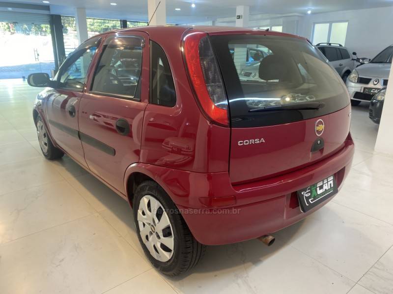 CHEVROLET - CORSA 1.0 MPFI 8V GASOLINA 4P MANUAL - 2003/2004 - Vermelha - R$ 24.900,00