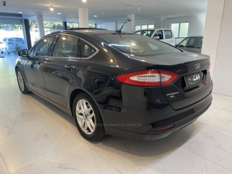 FORD - FUSION 2.5 16V FLEX 4P AUTOMÁTICO - 2014/2015 - Preta - R$ 75.900,00