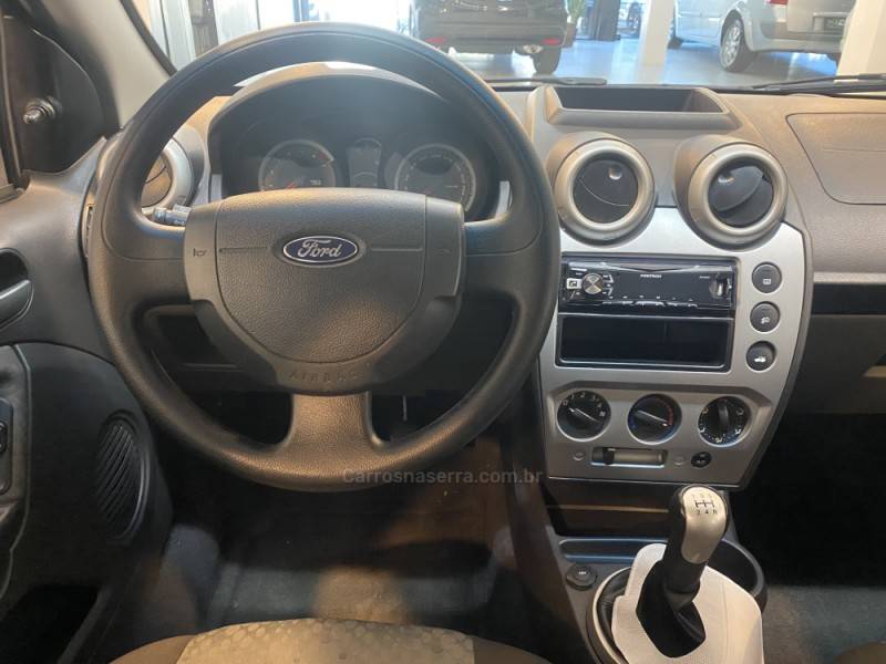FORD - FIESTA 1.6 ROCAM SE 8V FLEX 4P MANUAL - 2014/2014 - Vermelha - R$ 39.900,00