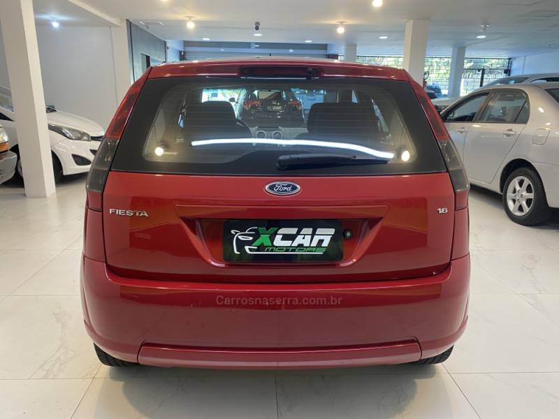FORD - FIESTA 1.6 ROCAM SE 8V FLEX 4P MANUAL - 2014/2014 - Vermelha - R$ 39.900,00