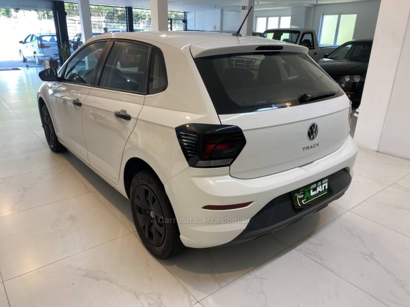 VOLKSWAGEN - POLO 1.0 MPI TRACK 4P MANUAL - 2023/2024 - Branca - R$ 72.900,00