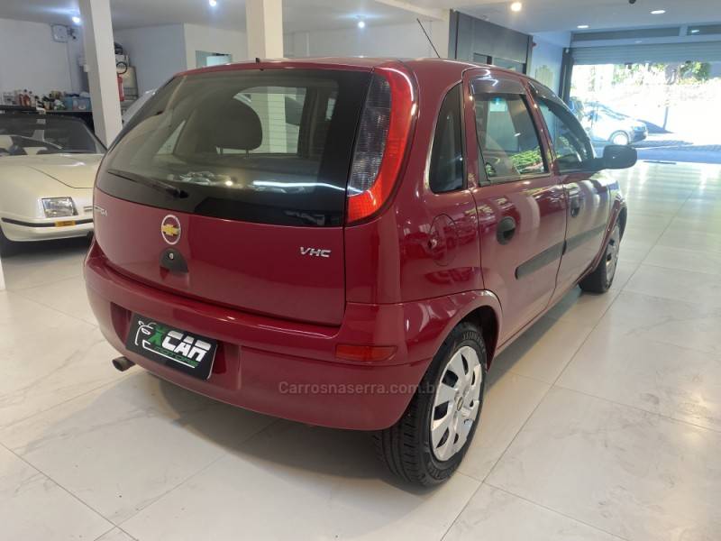 CHEVROLET - CORSA 1.0 MPFI 8V GASOLINA 4P MANUAL - 2003/2004 - Vermelha - R$ 24.900,00