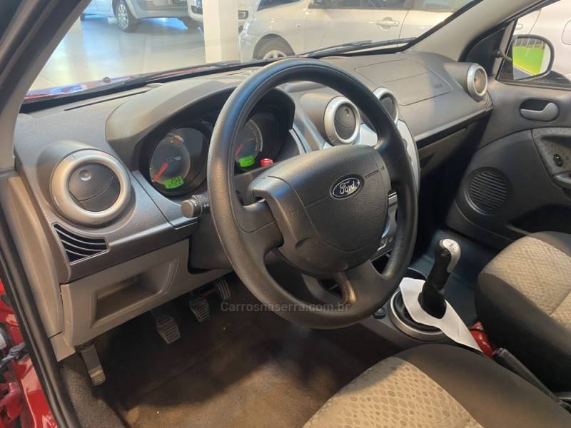 FORD - FIESTA 1.6 ROCAM SE 8V FLEX 4P MANUAL - 2014/2014 - Vermelha - R$ 39.900,00